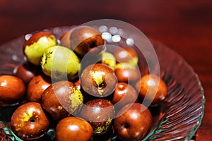 Fruit, jujube ball brown color green.