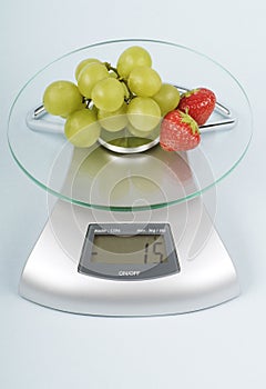 Fruit on a kitchen scale