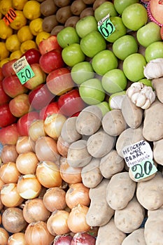 Fruit laid out on sale with price lists