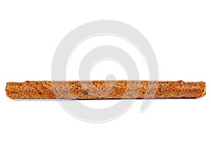 Fruit leather apricot roll isolated on a white. Tasty fruit pastille marshmallow