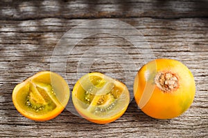 Fruit of lulo or naranjilla on wood