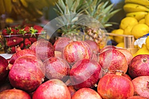 Fruit market - pomegranates, ananas and other fruits