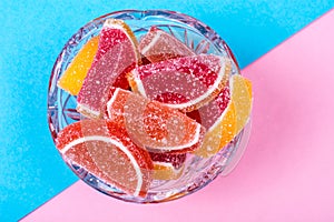 Fruit marmalade on bright colored background