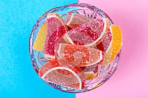 Fruit marmalade on bright colored background