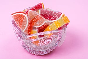 Fruit marmalade on bright colored background