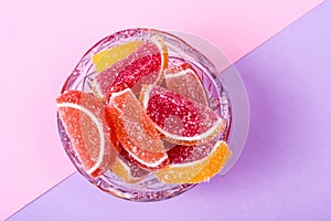 Fruit marmalade on bright colored background