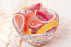 Fruit marmalade on bright colored background