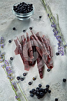 Fruit marshmallow. Berry pastille on light background. Pastille fruit rolls