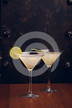 Fruit Martinis on rustic background with space for text. Vertical shot