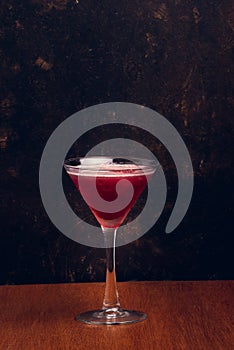 Fruit Martinis on rustic background with space for text. Vertical shot