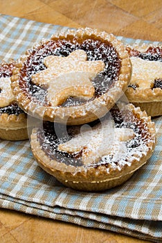 Fruit mince tarts for christmas day on tea towel