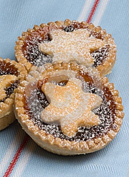 Fruit mince tarts for christmas day on tea towel