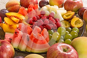 Fruit mix. Peach, grape, apple, watermelon, melon, raspberry, plum, close-up