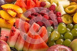 Fruit mix. Peach, grape, apple, watermelon, melon, raspberry, plum, close-up