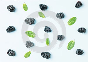 Fruit pattern. Blackberries with mint leaves