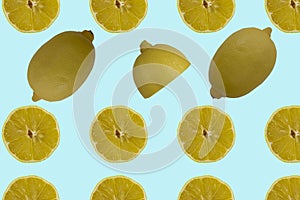 Fruit pattern. Colorful of fresh lemon texture slices on blue background. From top view. Photography collage