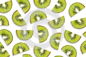 Fruit pattern of kiwi slices isolated on white background