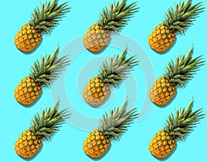 Fruit pattern with organic pineapples on bright azure background