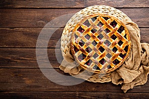 Fruit pie. Sweet pie, tart with fresh plums. Delicious cake with plums photo