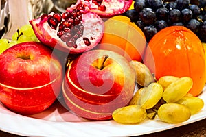Fruit in a plate on the table