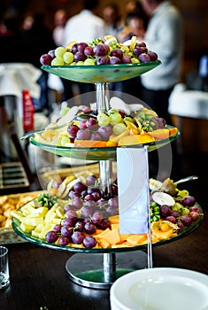 Fruit platter buffet at business or wedding event venue.