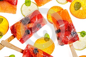 Fruit popsicles, homemade fruit ice lolly of various fruits, top view