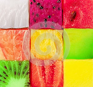 Fruit puzzle. Colorful food background or pattern arranged of different fruit cubes. Dietary concept