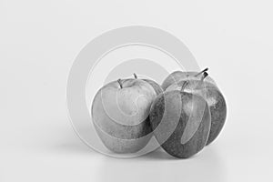 Fruit quintet with copy space. Apple fruits on light grey background. Apples in bright color photo