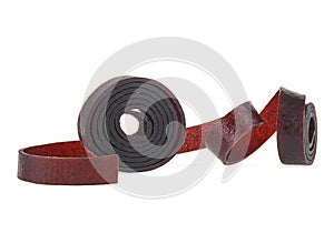 Fruit roll up bar, pastille isolated on white background. Food for vegans. Healthy snack food