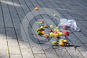 Fruit salad accidentally dropped to ground. Misfortune concept