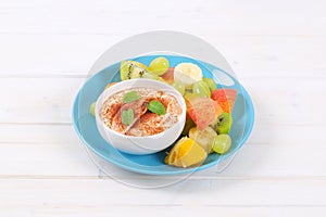 Fruit salad with cinnamon yogurt