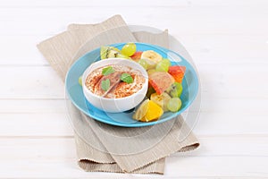 Fruit salad with cinnamon yogurt