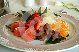 Fruit salad Close-up of fruit salad dessert in a plate