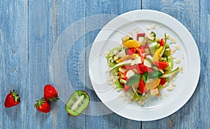 Fruit salad closeup, vegan food.
