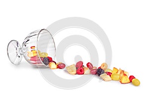 Fruit salad falls from glass bowl