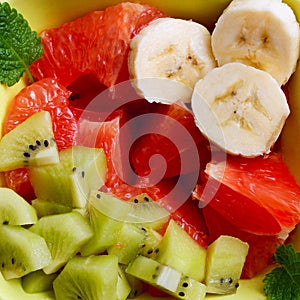 Fruit salad of kiwi, banana and grapefruit