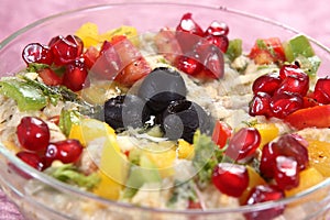 fruit salad with tahini granola and creamy yogurt.