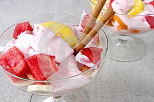 Fruit salad of yogurt watermelon bananas peach