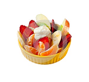 Fruit salad with yogurt in a yellow plate