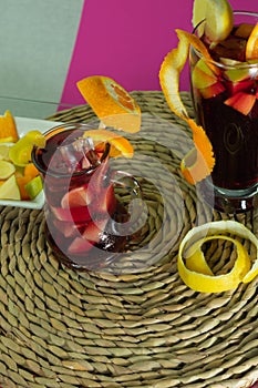 Fruit sangria on the glass table