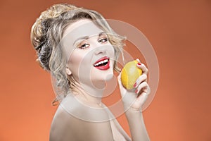 Fruit Series. Smiling Happy Naked Caucasian Blond Girl With Lemon