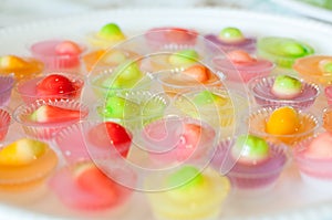 Fruit Shaped Mung Beans in Jelly close up in white foam dish, Wun Look Choup Thai sweets