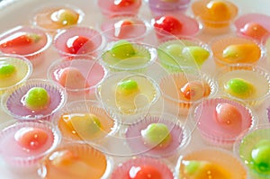 Fruit Shaped Mung Beans in Jelly close up in white foam dish, Wun Look Choup Thai sweets