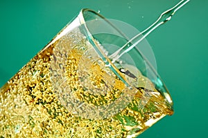 Fruit sparkling water is poured into a glass