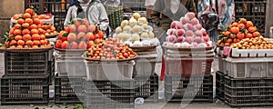 Fruit street vendors at Lao Kai, Vietnam-China border. Vietnamese woman street venders with orange, apple, chinese pear and photo