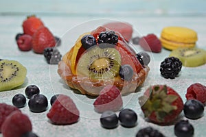 Fruit tart on blue board