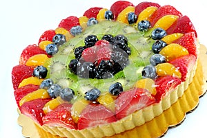 Fruit tart cake with strawberries, blue berries