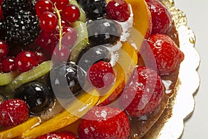 fruit tart, typical dessert made with shortcrust pastry and mixed fresh fruit