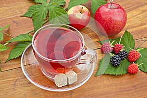 Fruit and tea with sugar