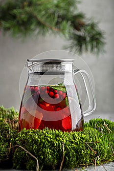 fruit tea in a teapot on the table
